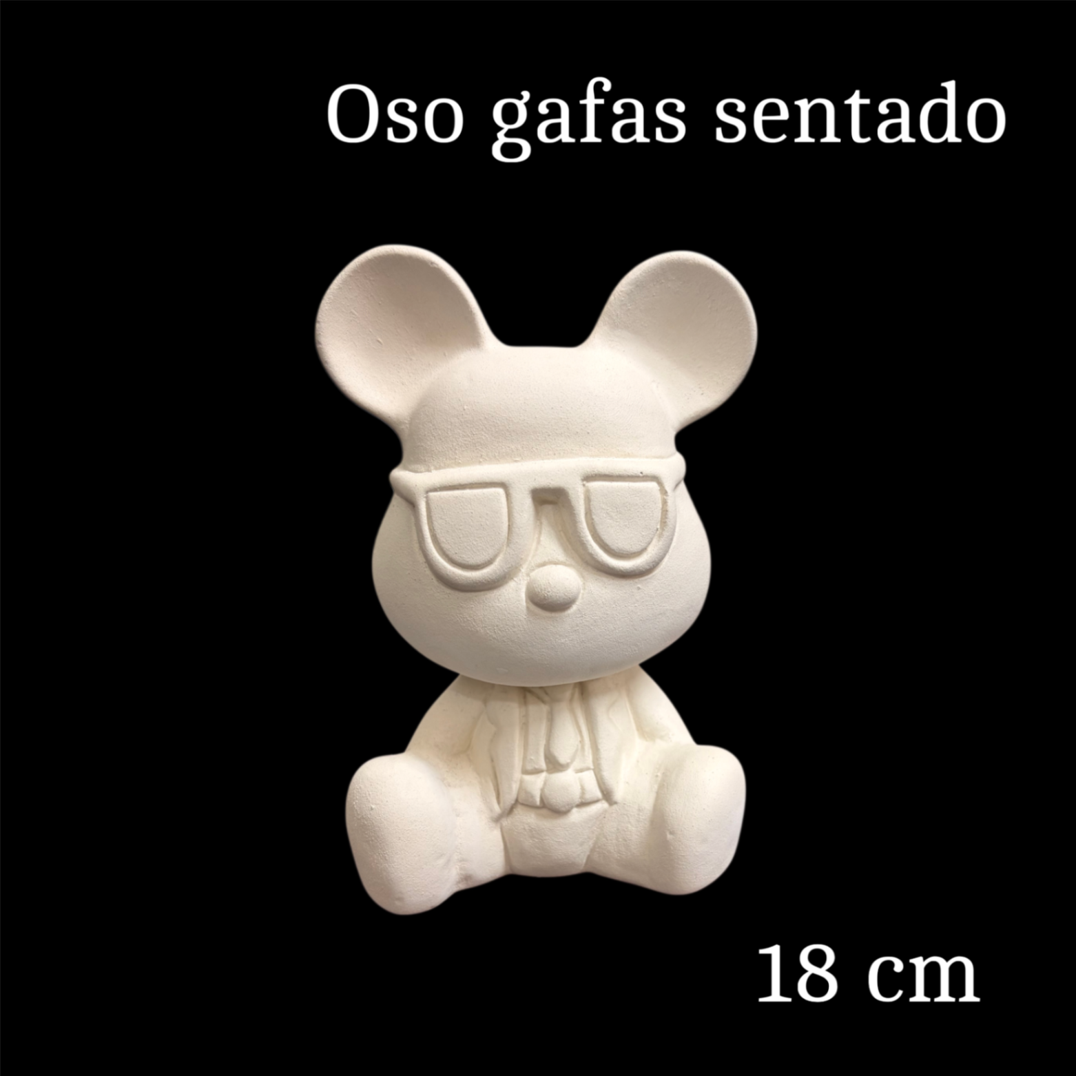 Oso gafas sentado
